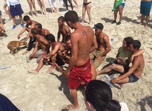 Tourists and area residents helped the 12 Cuban rafters who arrived today in Miami Beach. (Oscar Alfonso)