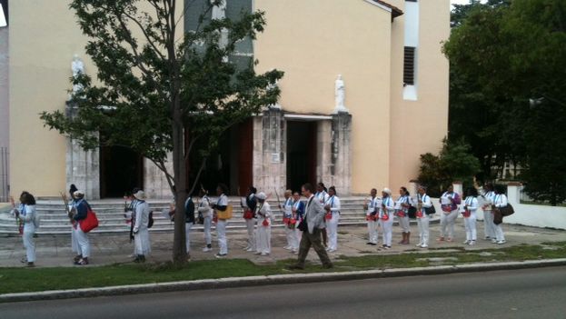 Ladies in White outside of the parish of Santa Rita in Havana. (Angel Moya)