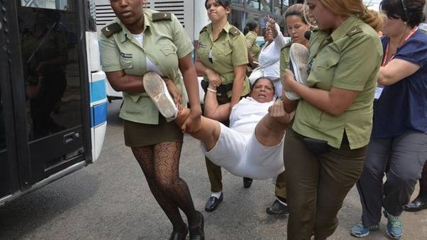 Arresting a Lady in White in Cuba