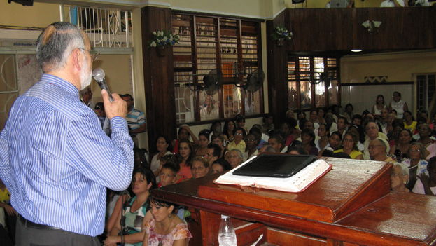 Minister holds a service in the Cuban Evangelical Church League (Hispanic Evangelical Church)