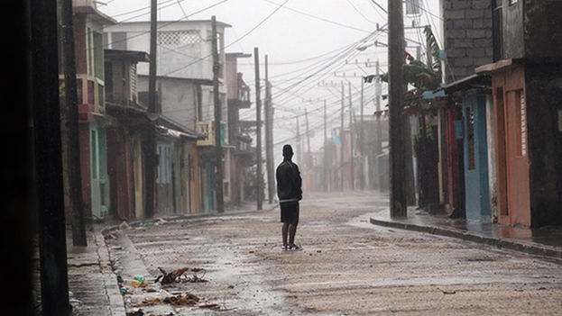 A man stands in the street in the city of Baracoa, in Guantanamo. (EFE)